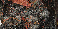 Strugi zakrzepłego szkliwa (meteoryt Millbillillie) (fusion crust)